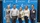 A group of five adults pose for a photo in front of a blue backdrop that reads “Texas A&M University Corpus Christi” with feather logos.