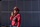 GCGV employee wearing red hard hat and walkie talkie.