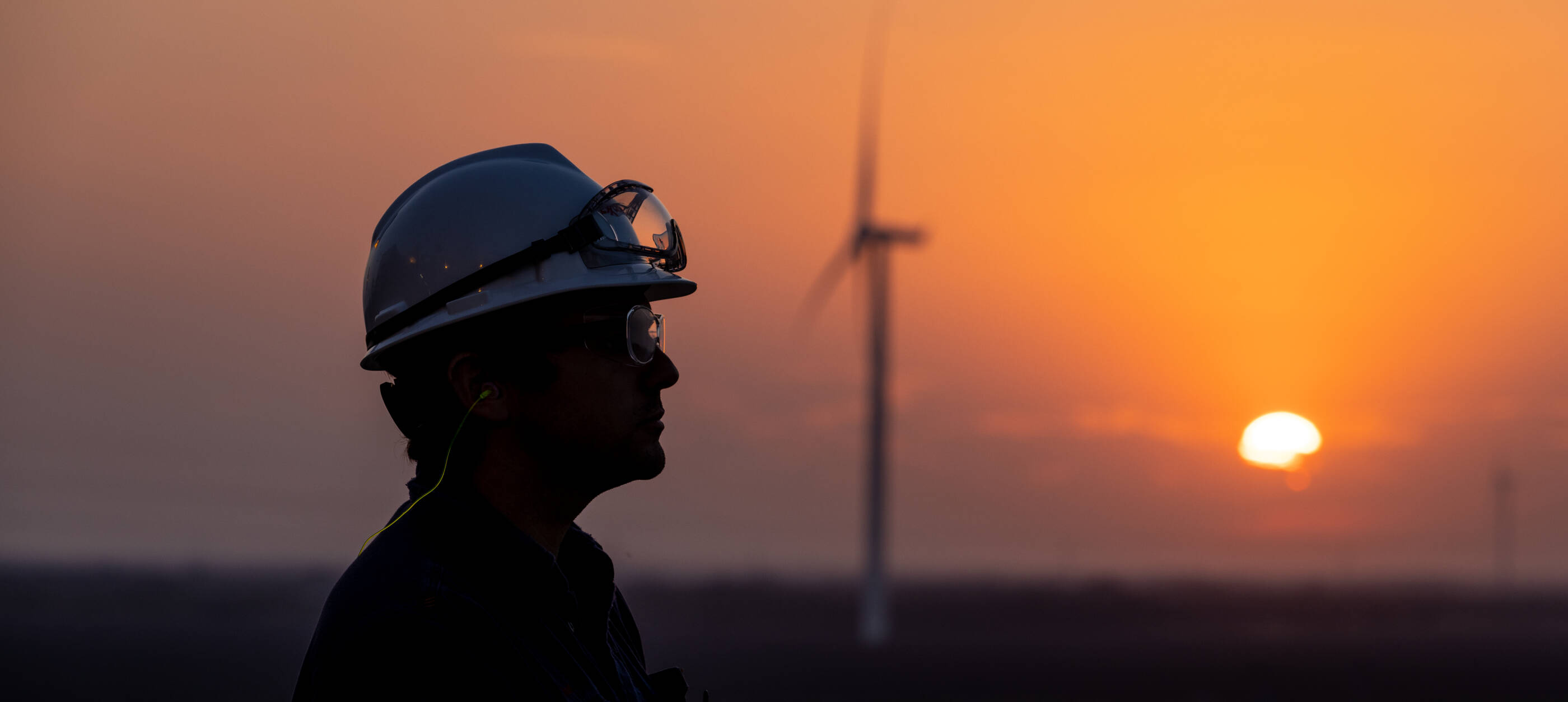 Employee wearing safety equipment