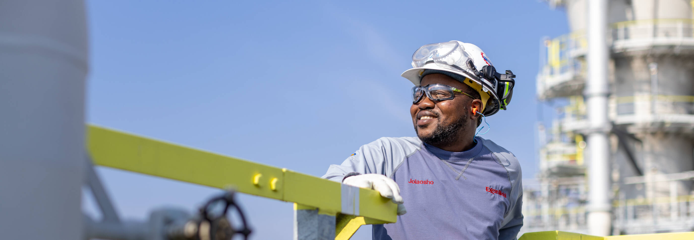 Employee wearing safety equipment