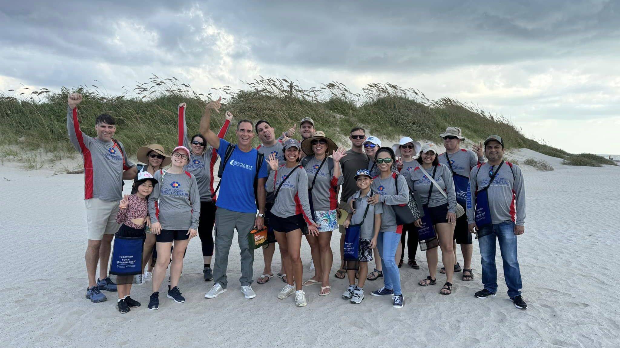 GCGV employees volunteering in a beach clean up event